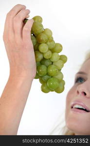 woman eating grapes