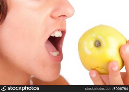 Woman eating green apple - isolated over white