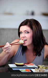 Woman eating Japanese food