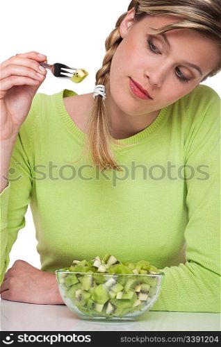 Woman eating kiwi on white background