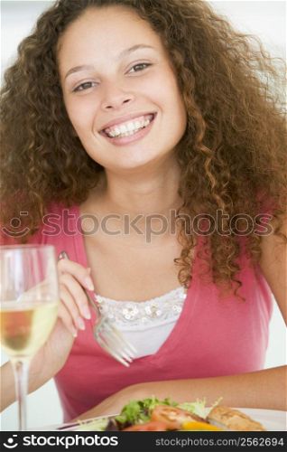 Woman Eating meal,mealtime With A Glass Of Wine