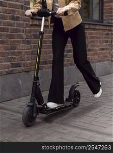 woman electric scooter outdoors