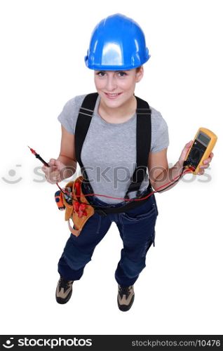 Woman electrician with multimeter