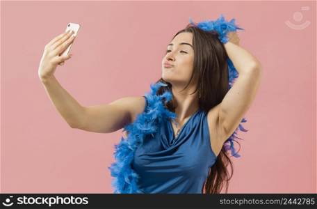 woman elegant dress wearing sunglasses party taking selfie