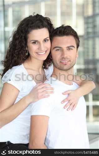 Woman embracing man