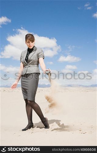 Woman emptying sand from her shoe