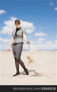 Woman emptying sand from her shoe