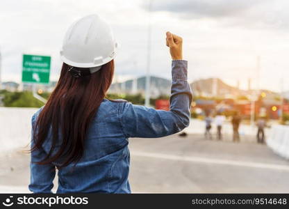 Woman engineer entrepreneur construction industry worker. Female engineer working refinery oil plant manufacturing. Young civil engineering construction wear hard hat safety helmet construction site.