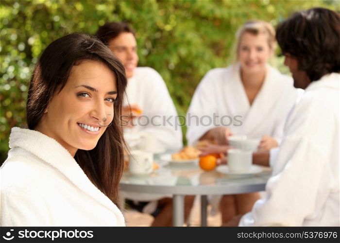 Woman enjoying breakfast outdoors
