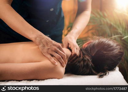 Woman Enjoying Deep Tissue Massage in Salon. Woman Enjoying Deep Tissue Massage