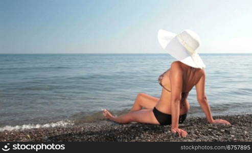 woman enjoying her vacation on a beach