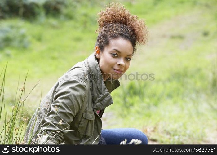 Woman Enjoying Walk In Countryside
