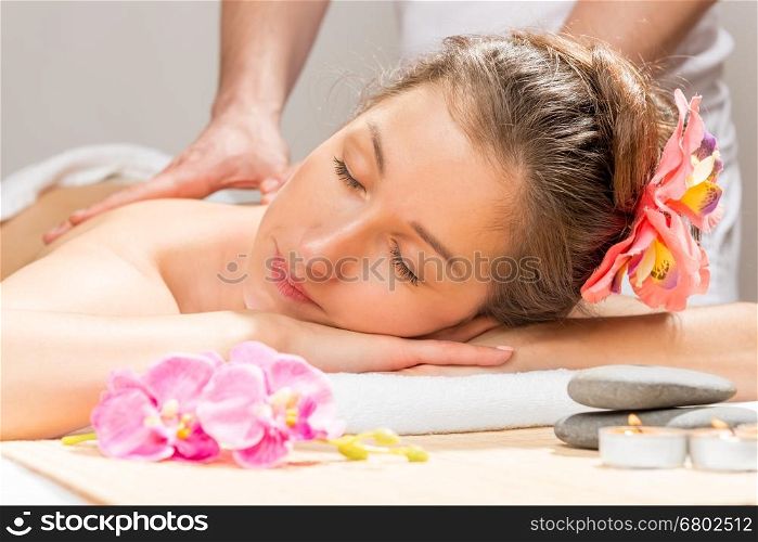 woman enjoys the spa cabinet during the massage