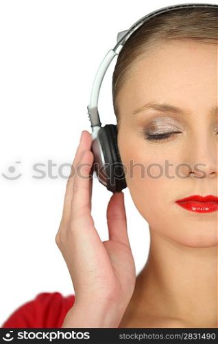 Woman enthralled by her music