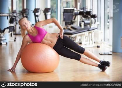 woman exercise pilates in fitness gym club