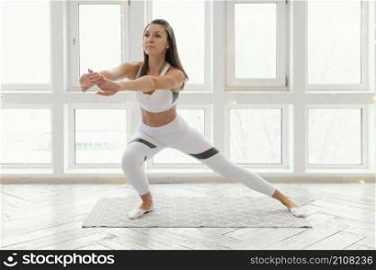 woman exercising mat
