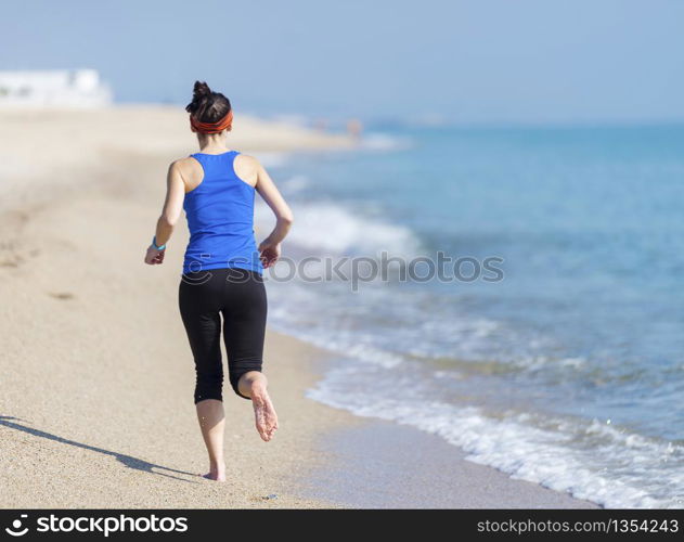 Woman Exercising On Beach ( running )