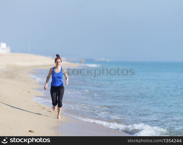 Woman Exercising On Beach ( running )