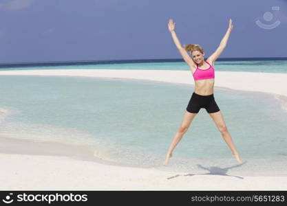 Woman Exercising On Beautiful Beach