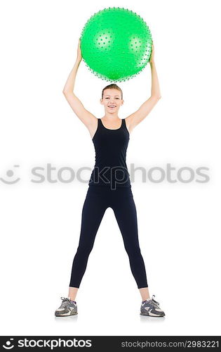 Woman exercising with swiss ball on white