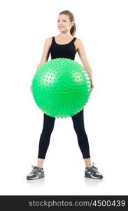 Woman exercising with swiss ball on white