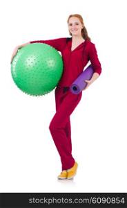 Woman exercising with swiss ball on white