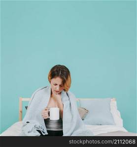 woman feeling sick bed