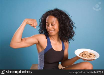 Woman Flexing with Cookies