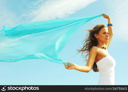 woman fly in the blue sky by fabric