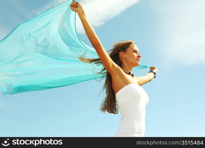 woman fly in the blue sky by fabric