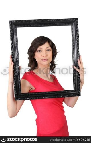 Woman framing herself
