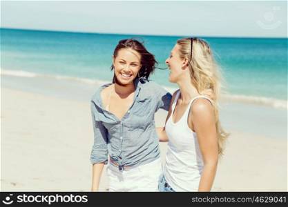 Woman friends on the beach. A picture of two women having good time on beach