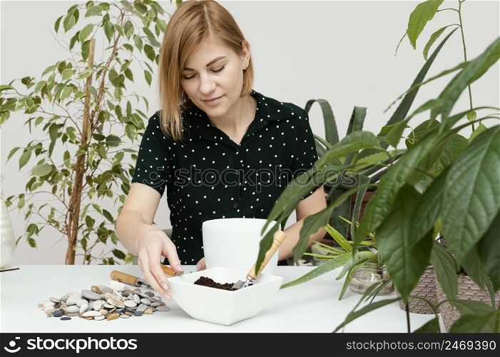 woman gardening indoors