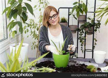 woman gardening with gloves