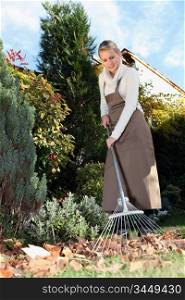 woman gardening with rake