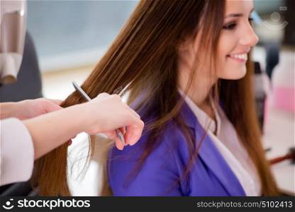 Woman getting her hair done in beauty shop