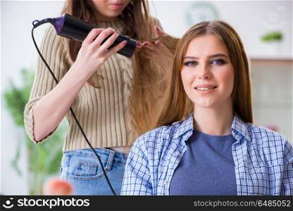 Woman getting her hair done in the beauty salon