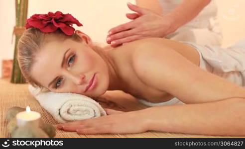 woman getting massage at spa