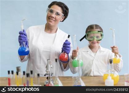 woman girl doing science lab