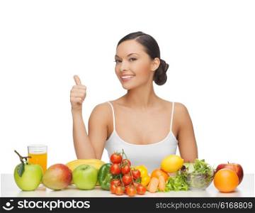 woman gives thumbs up with lot of fruits and vegetables. woman gives thumbs up with fruits and vegetables