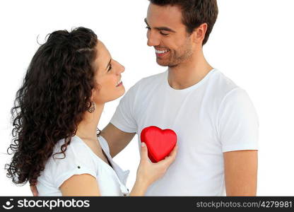 Woman giving man her heart