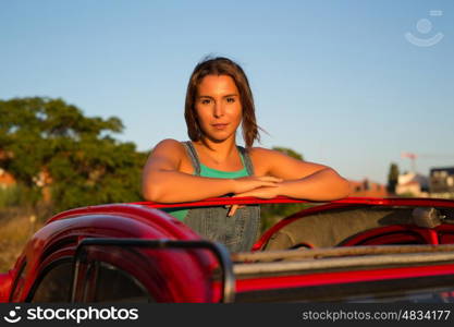 Woman going on a roadtrip in her convertible car