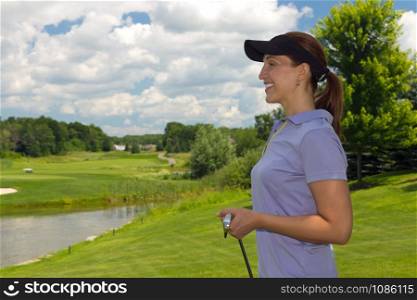 Woman golfer looking at copy space