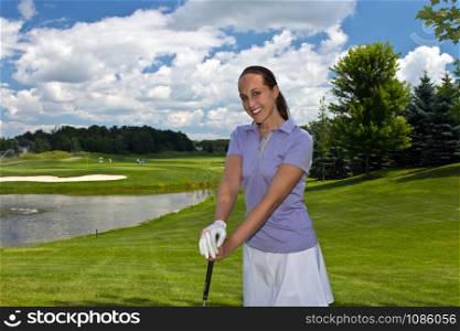 Woman golfer on the fairway