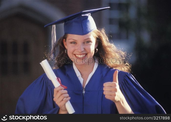 Woman Graduate Giving Thumbs Up