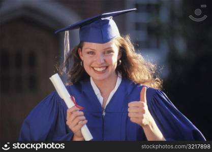 Woman Graduate Giving Thumbs Up