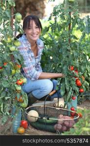 Woman growing vegetables
