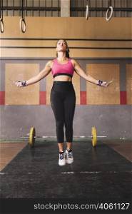 woman gym skipping rope