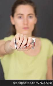 woman hand crushing a packet of cigarettes stop smoking concept