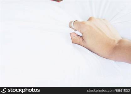 Woman hand having sex on a bed in morning, Hand sign love and sex concept